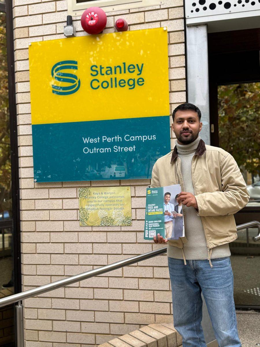 Fourway Global Advisory at the Stanley College West Perth campus entrance, holding the 2026/2027 international student fees and intake dates guide.